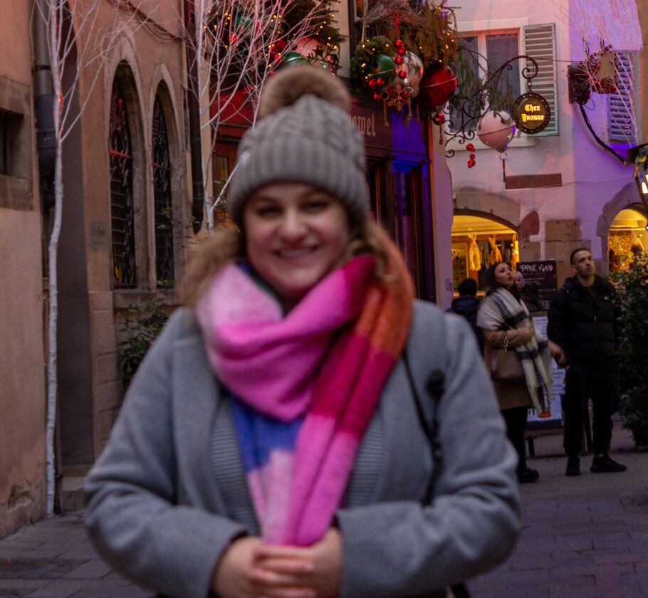 Adi in an alley in Strasbourg, France during the holiday season