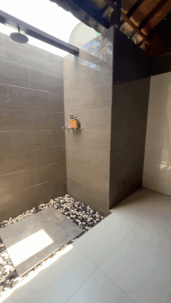 Outdoor shower in Bali hotel room