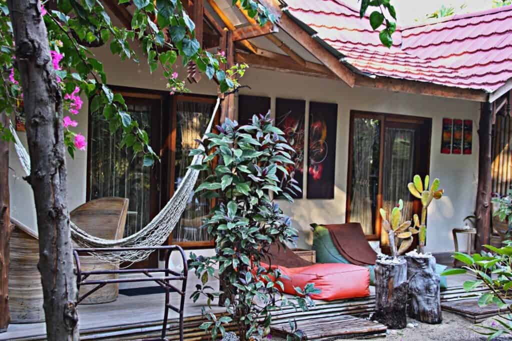 Peaceful front veranda of the Meno Dream Resort rooms