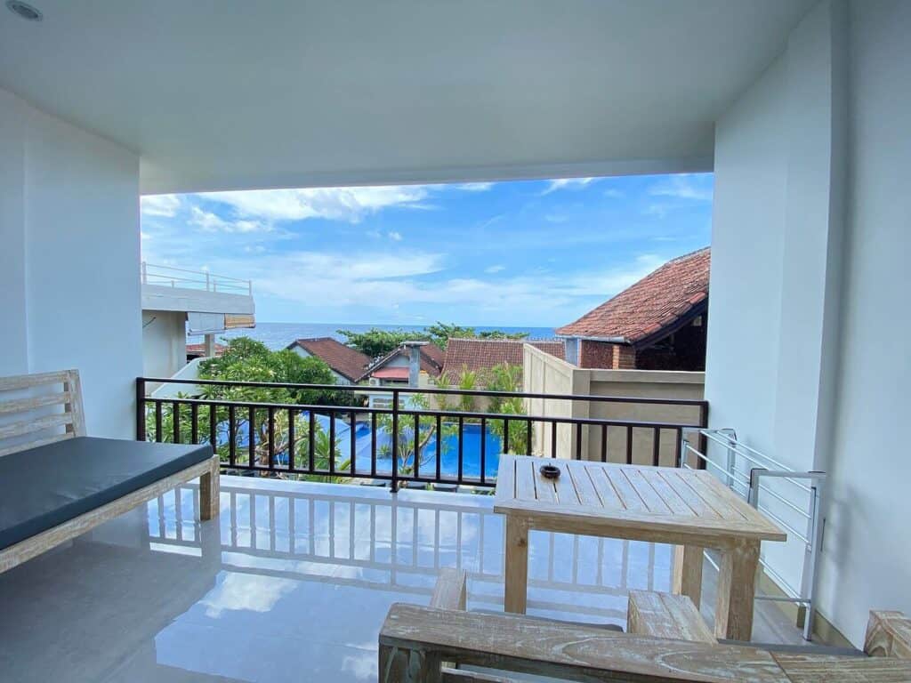 Spacious balcony on top floor room at Solaluna Homestay in Amed