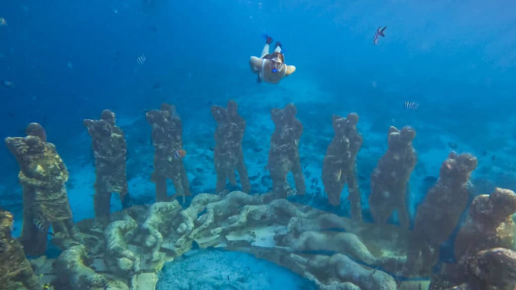 Snorkeling to the NEST underwater statues off the shore of Gili Meno