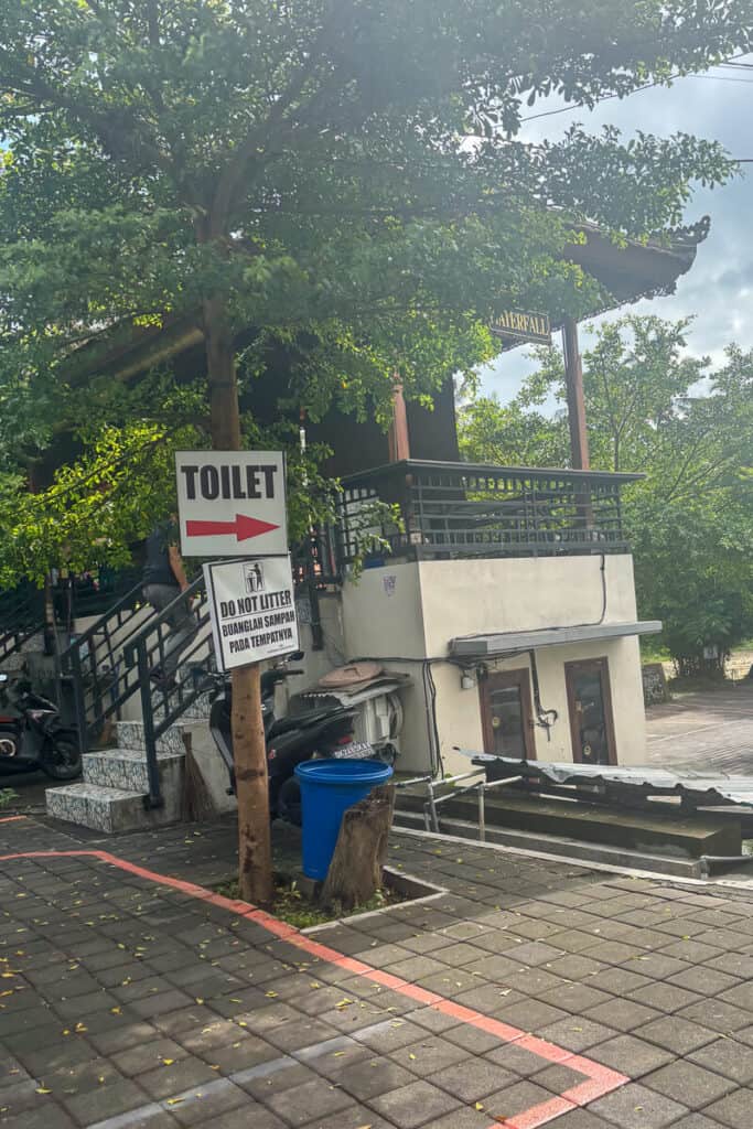 Signage for the toilets near one of the waterfalls in Ubud on this route.