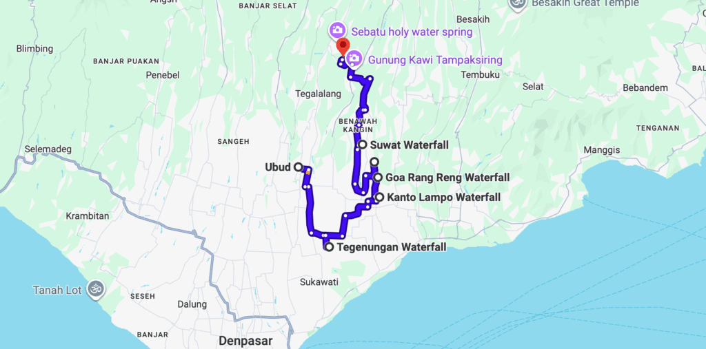 Google Maps screenshot showing a one-day driving route from Ubud to five nearby waterfalls in Bali. The route includes Tegenungan, Kanto Lampo, Goa Rang Reng, Suwat Waterfall, and ends near Gunung Kawi and Sebatu holy water spring, highlighting key stops for an Ubud waterfalls road trip.